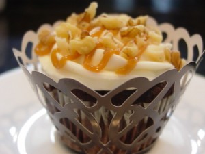 chocolate cupcake with cramel filling in lace cupcake wrapper