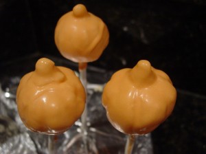 pumpkin cake pops in cake pop holder