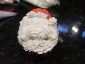 Santa Cupcake red hat figure piped