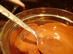 Melting down Chocolate for reindeer antlers on reindeer cupcake