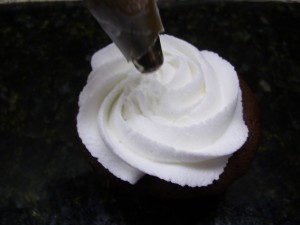 Vanill iced cupcake for the reindeer cupcake step 1